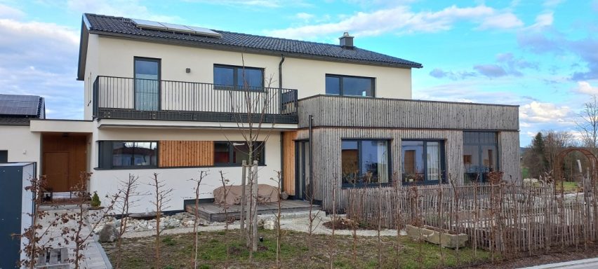 Putzfassade und Naturholz Holzhaus Putzfassade Kombination mit Holz